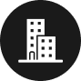 Icon of two white buildings with windows on a black circular background. The larger building has more floors and is positioned behind the smaller one, symbolizing condo insurance protection.