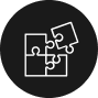 A black circular icon with four interconnected white puzzle pieces, symbolizing connection and problem-solving, reflects the intricacy of condo insurance in Broward County.
